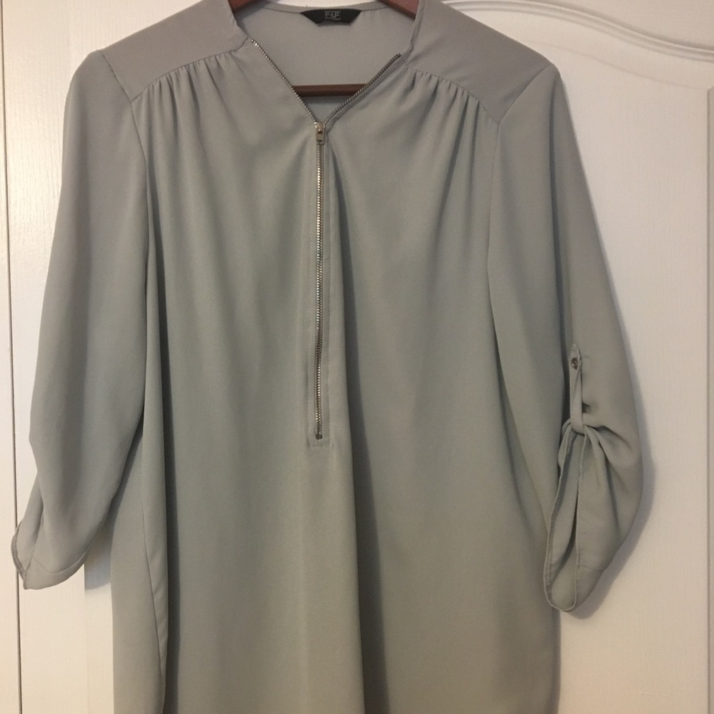 Tunic style blouse.